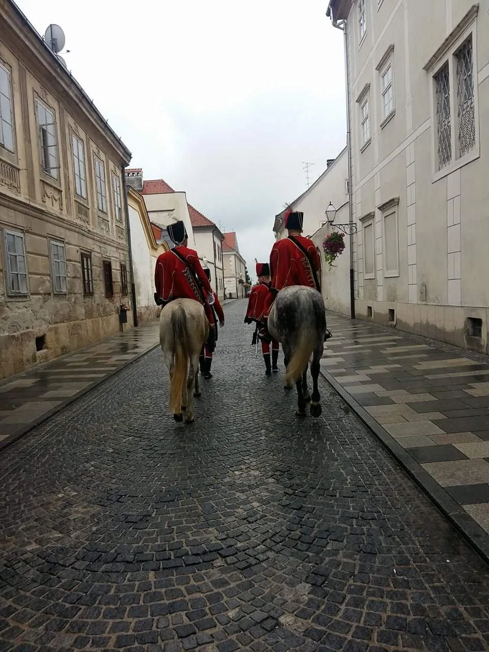 Historical street with riders in costume
