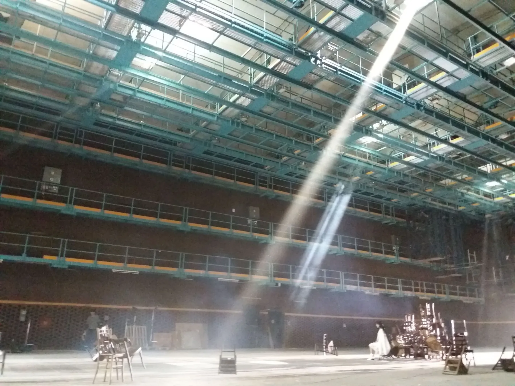 Large studio floor with production crew